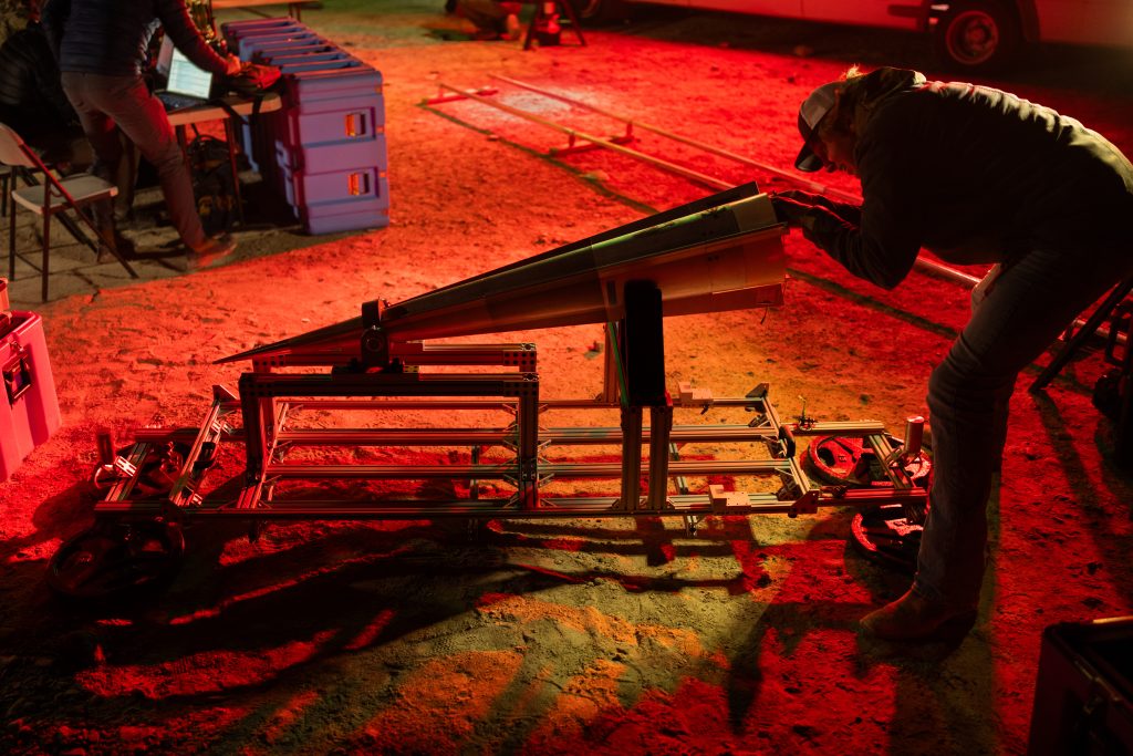 <strong>Sandia National Laboratories researchers prepare a 1:2 scale Aires Tide flight vehicle for release from a balloon at Dugway Proving Ground, Utah.</strong> (Photo by Craig Fritz) Click on the thumbnail for a high-resolution image.