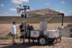 <strong>A team from Sandia National Laboratories sets up a portable sensor trailer for an exercise to test rapidly deployable systems for military applications and border security. This system can be pulled by a vehicle or flown in a helicopter.</strong> (Photo by David Lienemann) Click on the thumbnail for a high-resolution image.