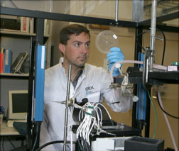 Eric Cummings inspects an iDEP device