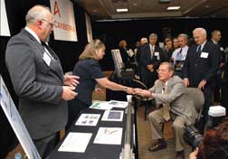 Sen. Pete Domenici, R-N.M., receives a briefing at a recent Sandia event