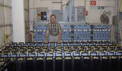 Jerry Ginn displays some of Sandia’s battery storage capability