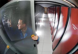Sandia's long row of Red Storm cabinets give hints of the
supercomputer's dazzling scalability.
