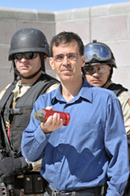 Inventor Mark Grubelich with Lt. Chris Dallas and Tristan DeSantis of Sandia's Protective Force.