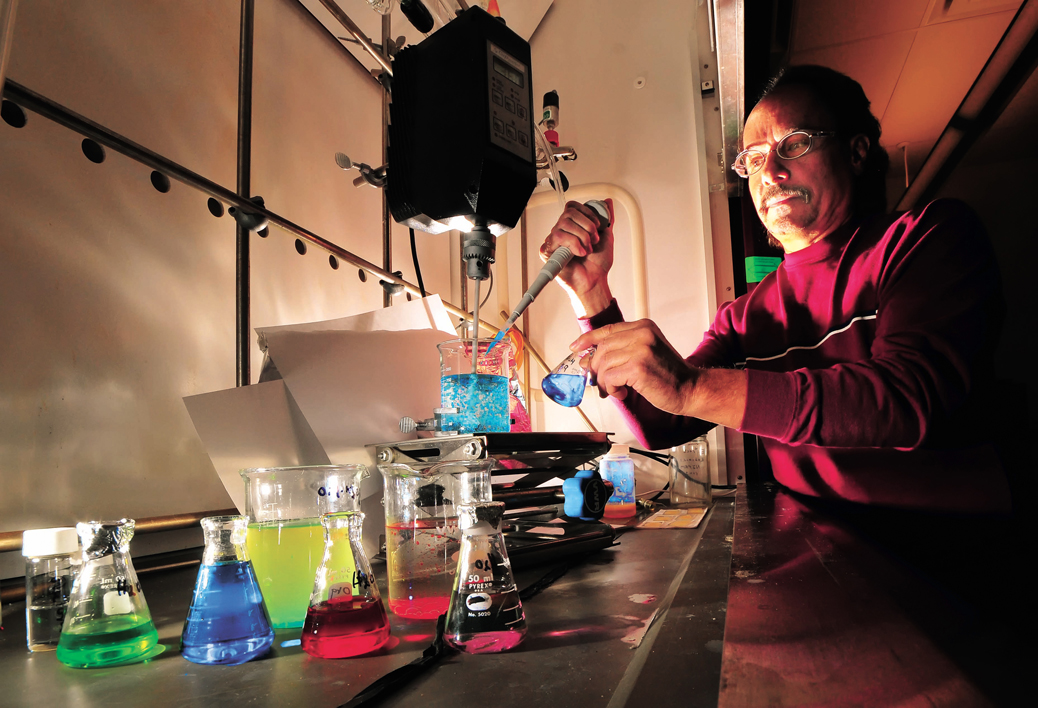 Duane Schneider demonstrates a microencapsulation process