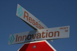 Roadsigns mark the intersection of Research Road and Innovation Parkway